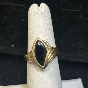 437097 14k yg diamond and onyx 4g